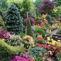 шикарный ландшафтный дизайн сада в английском стиле с деревьями фото