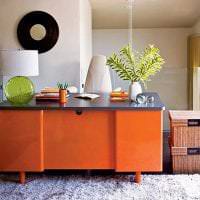 сочетание яркого оранжевого в дизайне спальни с другими цветами картинка