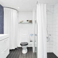 идея необычного интерьера ванной комнаты в черно-белых тонах фото
