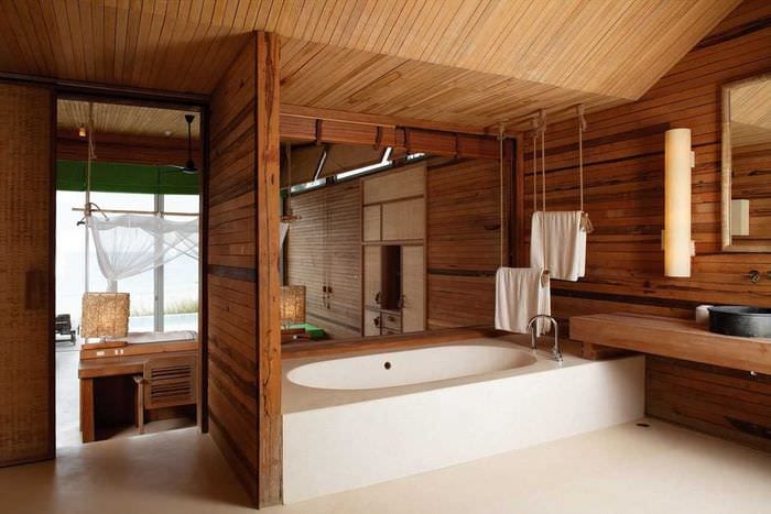 вариант современного интерьера ванной в деревянном доме
