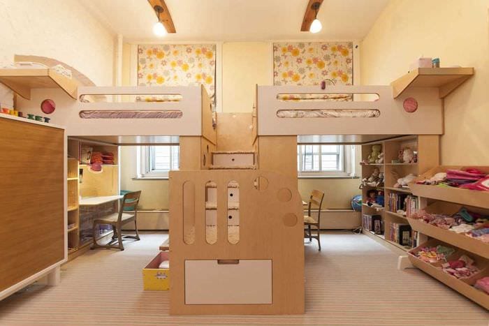 вариант красивого дизайна детской комнаты для двоих девочек
