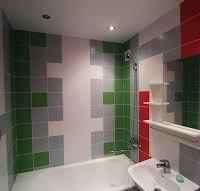 пример необычного декора укладки плитки в ванной комнате фото