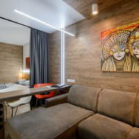 Дизайн квартиры студии с ламинатом на стене