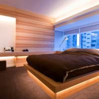 Кровать на подиуме с неоновой подсветкой