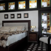 Контраст белого цвета на фоне черного интерьера спальни