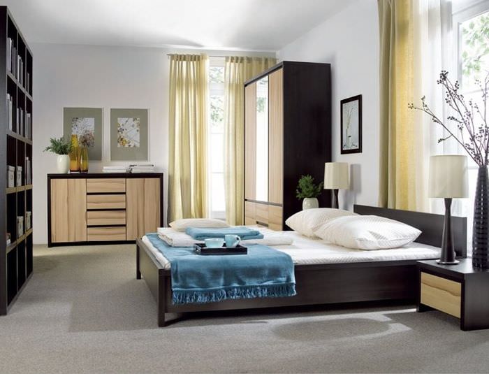 Дизайн угловой спальни в двухкомнатной квартире