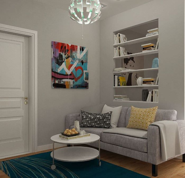 Интерьер гостиной в серых тонах в однокомнатной квартире 38 кв м