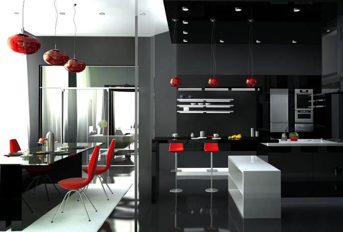 Красные подвесные светильники на черной кухне
