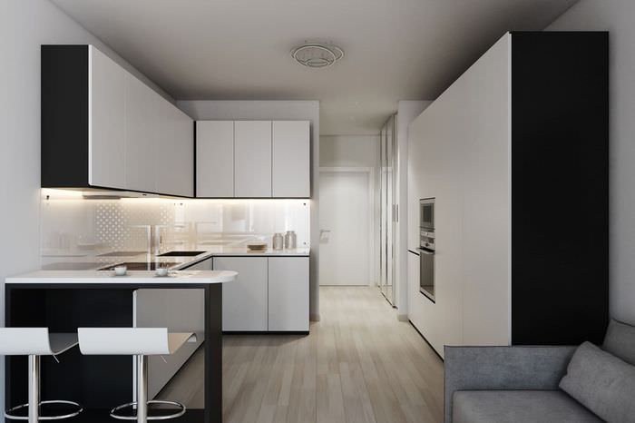 Кухонная зона в квартире-студии стиля минимализм