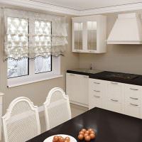 Белая кухонная мебель с черными столешницами
