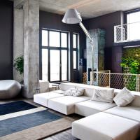 Серый бетон в интерьере квартиры-студии